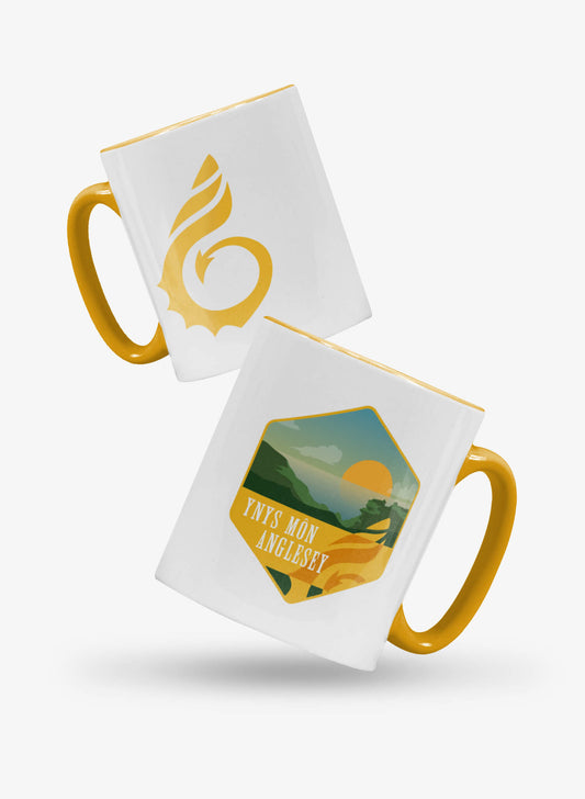 Anglesey design ceramic tea or coffee mug with yellow inner lip and handle.