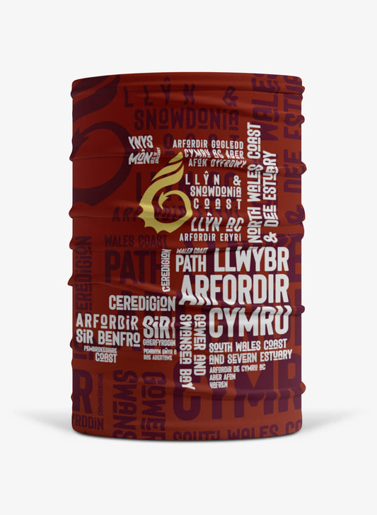 Burgundy multi-functional face covering featuring place names from the Wales Coast Path
