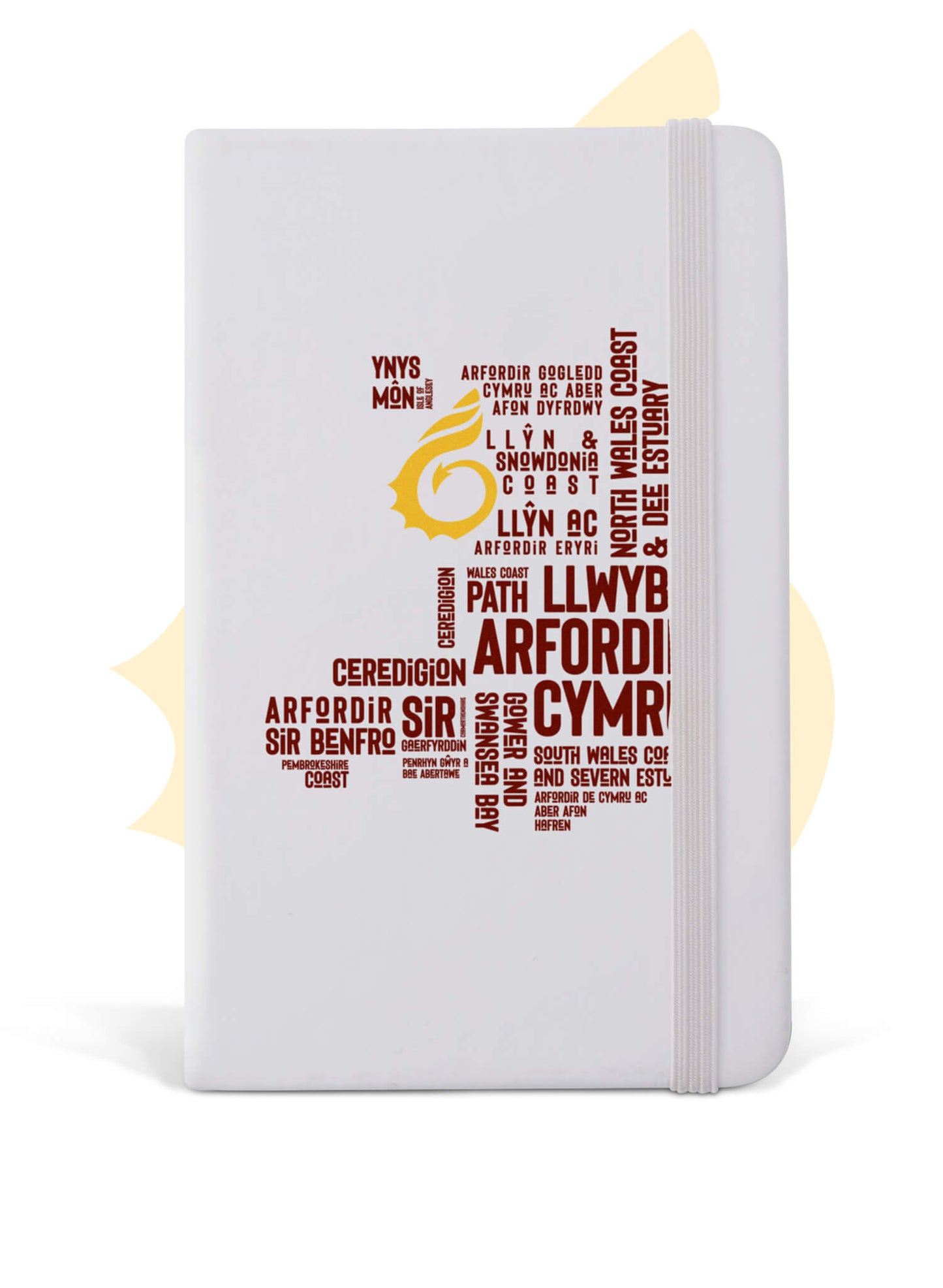 White A5 notebook featuring place names from the Wales Coast Path.