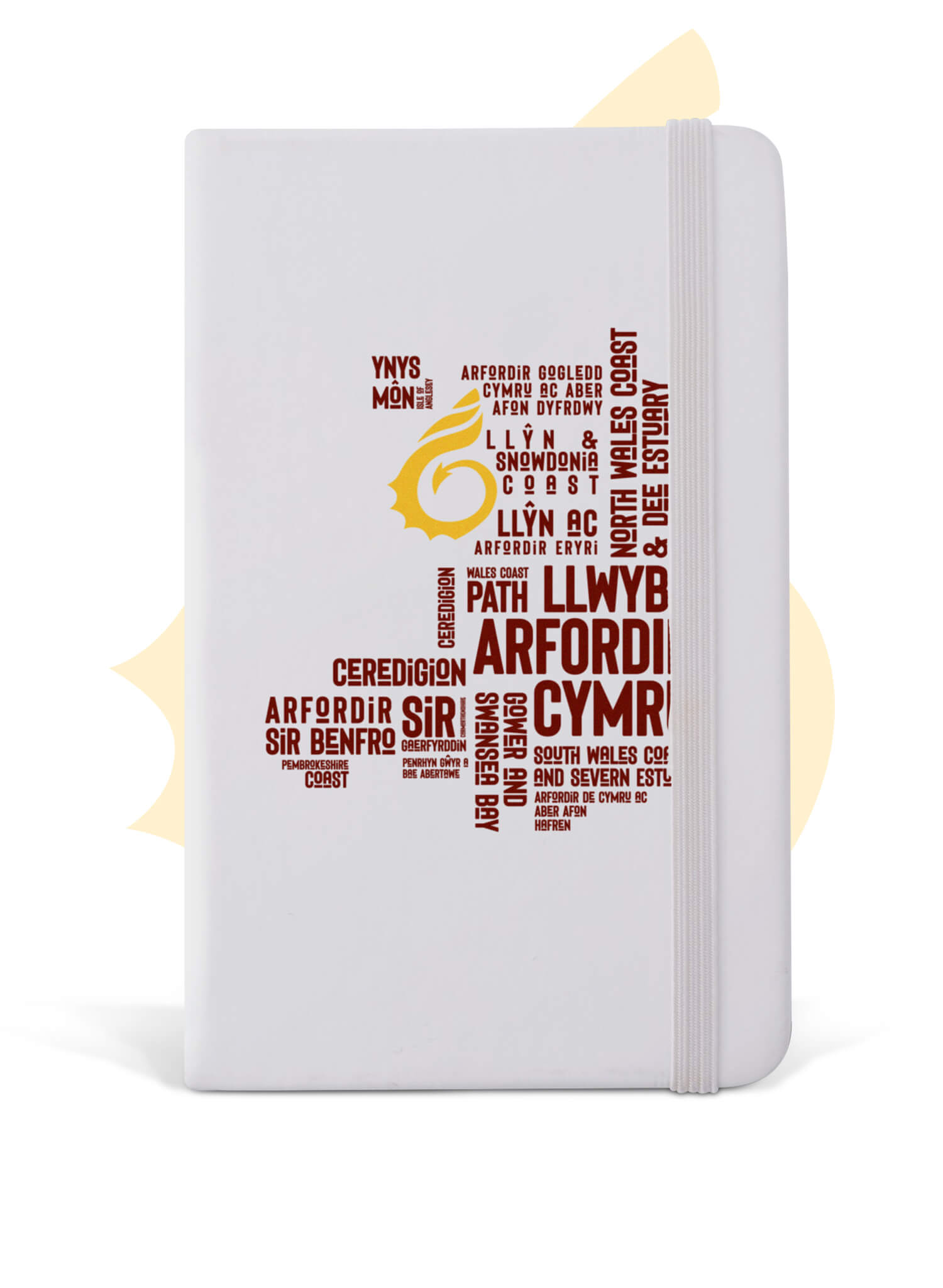 White A5 notebook featuring place names from the Wales Coast Path.
