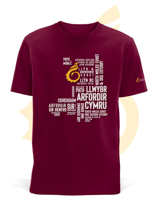 Burgundy unisex t-shirt featuring place names from the Wales Coast Path.